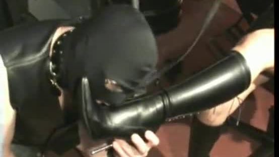 Slave licking and sucking leather boots of horney latex mistress